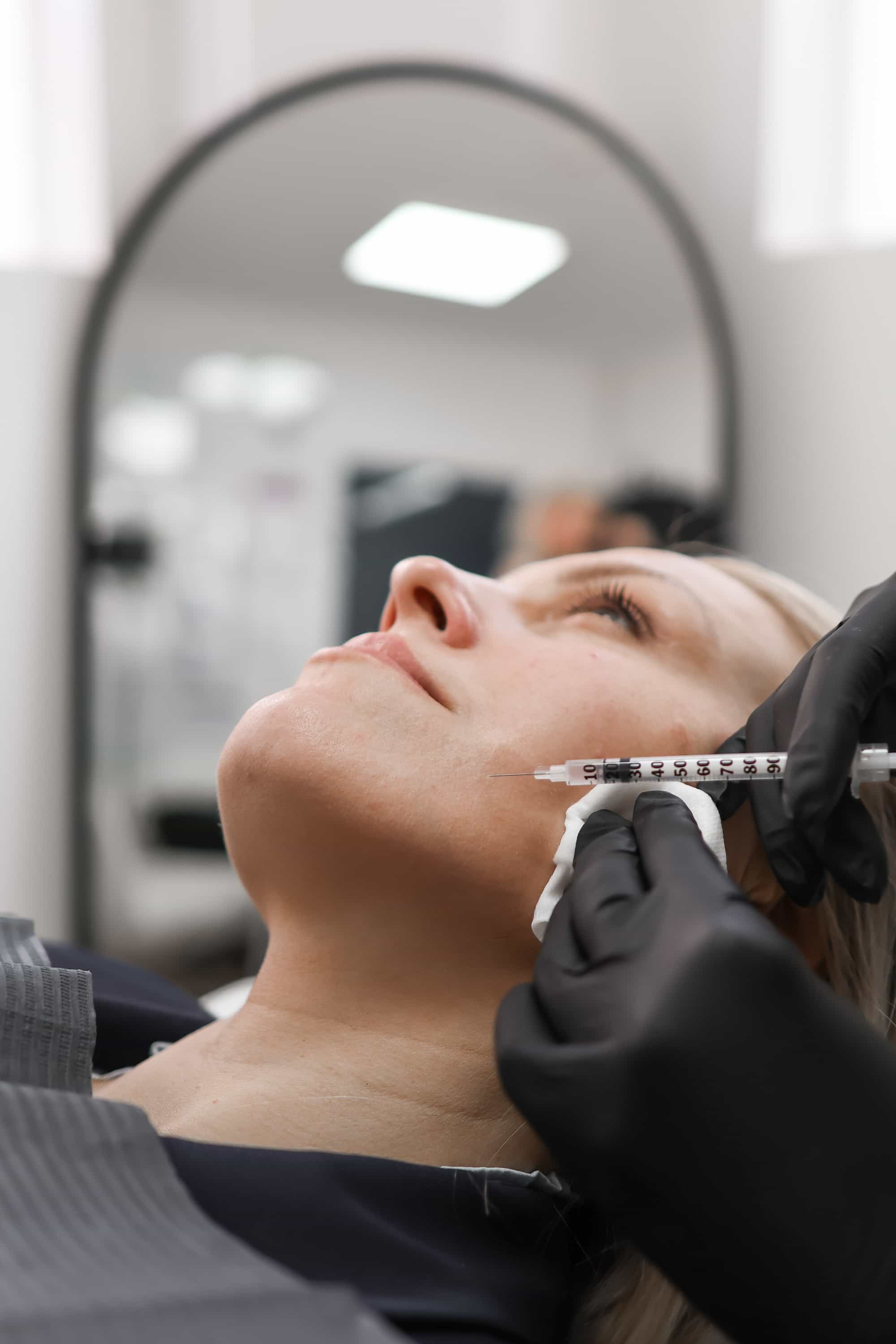 Downturned smile treatment at It’s Me and You Clinic in Kingston upon Thames, Surrey – dermal fillers and Botox to lift mouth corners and restore a youthful, balanced smile.