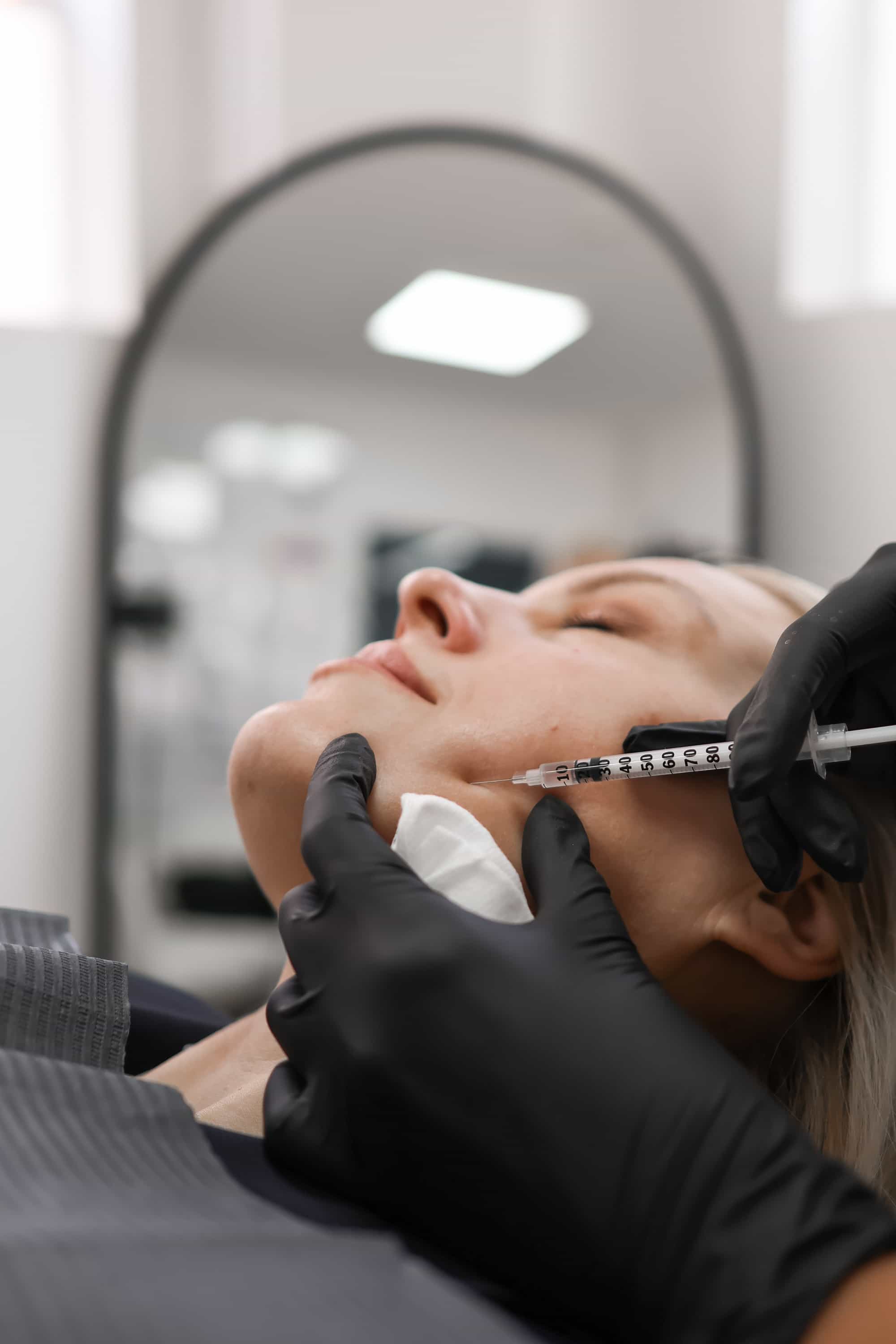 Downturned smile treatment at It’s Me and You Clinic in London, Kingston upon Thames and Surrey – dermal fillers and anti-wrinkle injections to lift mouth corners and restore a youthful smile.